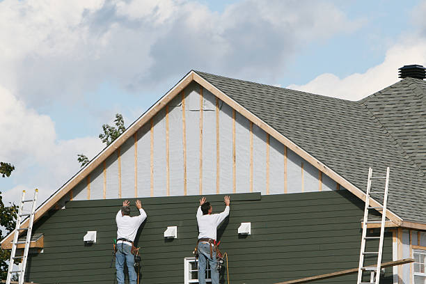 Professional Siding technician working in Sandyville, OH